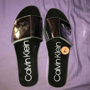 Silver Calvin Klein slides